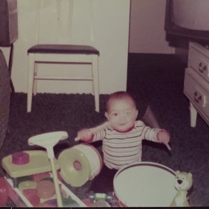 Me-playing-a-toy-drum-1974   